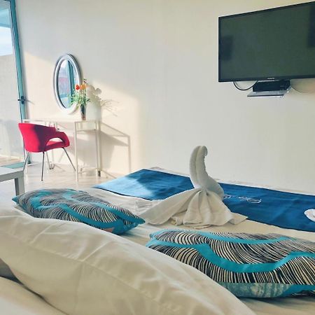 Sur La Mer Hotel Ashdod Bagian luar foto